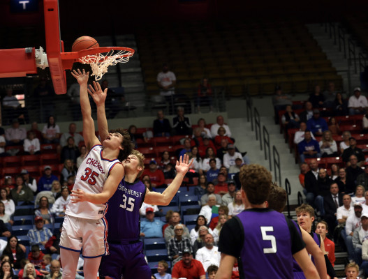 ABOVE: Josh Burdick puts up a shot for Cheney during the Cardinals’ 3A State game against Southeast of Saline. LEFT: Carter Peintner shoots as a Souteast of Saline defender attempts a block. Andrea McDaniel/ Contributed photo