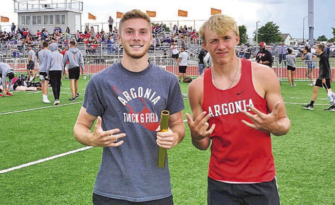 Argonia High School exchange student Max Siegmann, left, poses for a photo with Dalton Morrison. Siegmann, who hails from Germany, represented the Raiders on the AHS track team this spring. Contributed photo