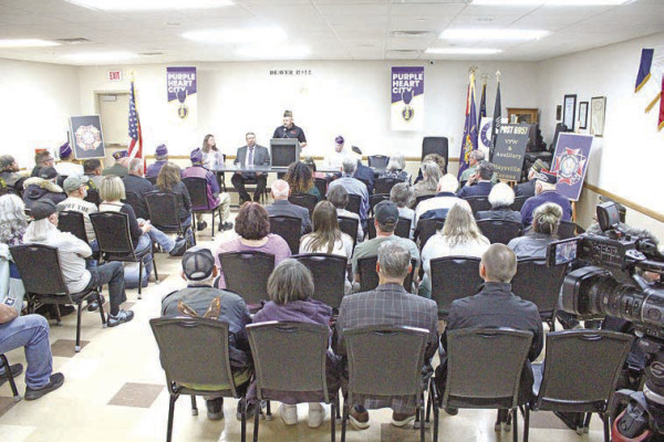 Travis Mounts/TSnews LEFT: A full house attended Monday’s ceremony recognizing Haysville as a Purple Heart City. 