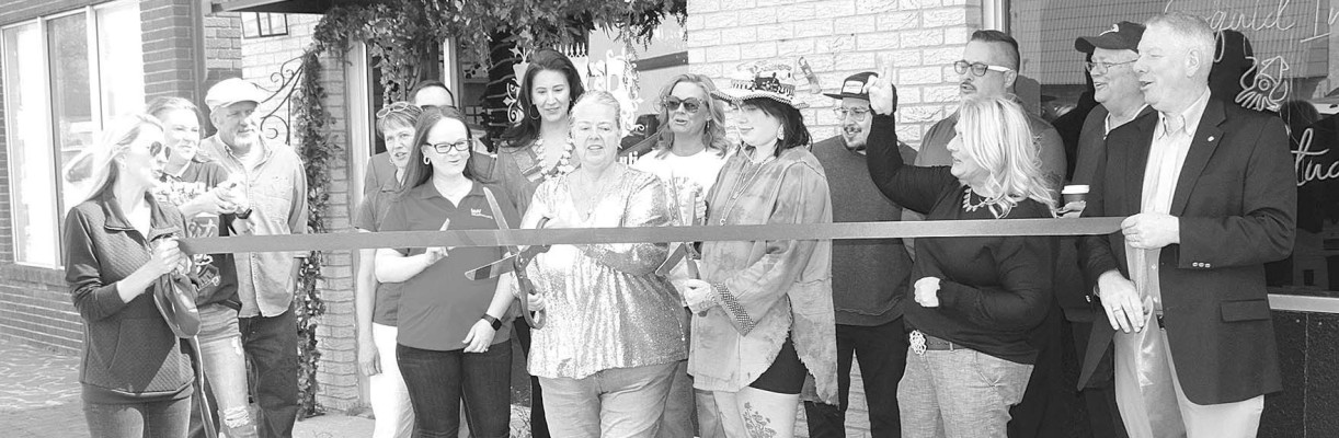 The Goddard Chamber of Commerce held a ribbon cutting last Friday for two new businesses. The event recognized REB Design Studio and Boutique, located at 108 N. Main in downtown Goddard, and Squid Ink Tattoo Studio, located next door at 106 N. Main. See new business stories in next week's newspaper. Travis Mounts/TSnews
