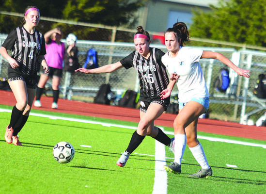 Kylee King of Campus and Leila Kral of Eisenhwoer battle for the ball during last Thursday’s game, which was played at Clearwater High School. The Campus Colts’ team includes several Clearwater Indians as part of the ongoing cooperative between the schools. Stephanie McKennon/TSnews