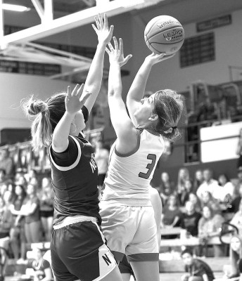 Macey Batt shoots over a Neodesha defender during Cheney’s substate victory on Saturday. The Cardinals are looking to improve upon last year’s secondplace finish in the 3A State tournament. Andrea McDaniel/ Contributed photo