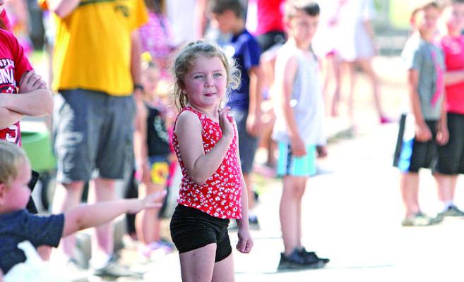 A girl watches the 2022 Argonia Days parade. File photo