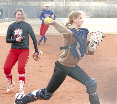 CSA Reds softball players run drills during Monday’s practice in Conway Springs. The new team will have its first games next Monday. The Reds will travel to El Dorado to face the Wildcats. The girls’ first home games will be March 31 when they face Wichita North. Travis Mounts/TSnews