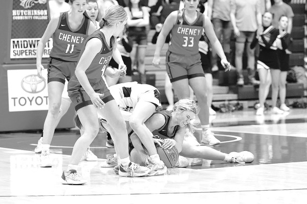 Anna Martin fights for a loose ball during Cheney’s Friday win over Phillipsburg. Jean Nance/TSnews