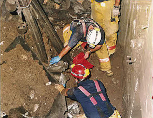 First responders search for bodies and body parts in the rubble following the DeBruce grain elevator explosion. Contributed photo/Sedgwick County Fire District No. 1