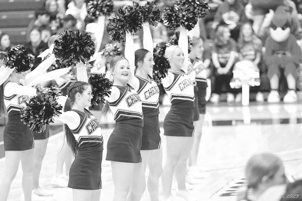 LEFT: The Cheney cheerleaders perform during a timeout. Jean Nance/TSnews