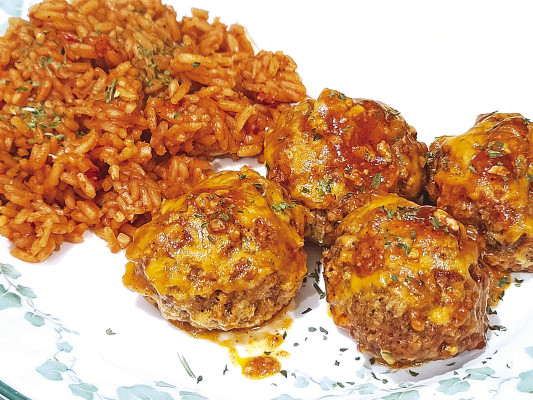Enchilada meatballs take all the wonderful flavors from the classic Mexican dish and serve them up in meatball form. They are great for dinner with a side of rice.