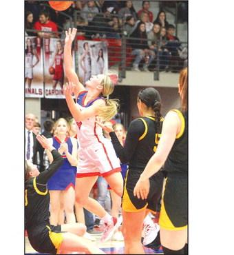 Elina Bartlett cuts through the lane during Saturday’s championship game against the Goodland Cowgirls. Travis Mounts/TSnews