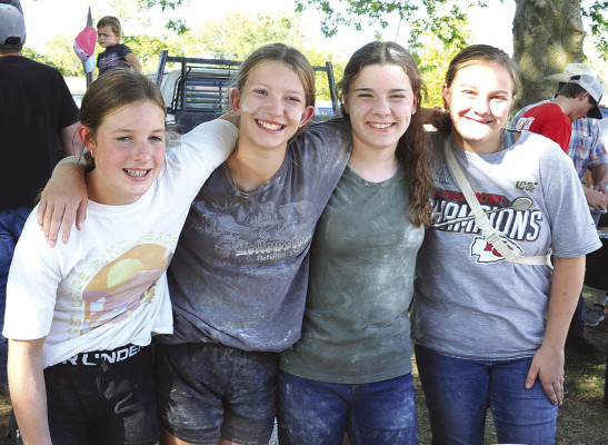 The fish coating crew takes a break from the hard work to pose for a photo on Sunday afternoon at the Milton Baptist Church fish fry, held annually on Labor Day weekend. This is the largest event in Milton each year. See more photographs on Page A8. Dale Stelz/TSnews