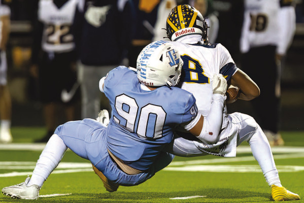 Drayton Oakes made two second-half sacks during last Friday’s home game against the Wichita Northwest Grizzlies. The Tigers came back from a 14-point deficit, but lost on a last-second field goal. Matt Buchar/Ginger Viking Fotos