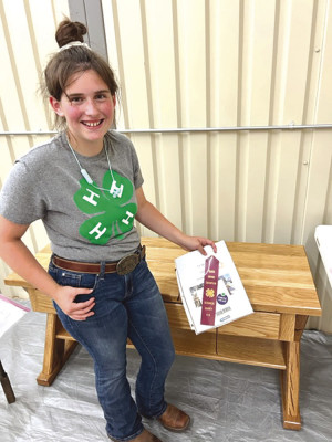 Leah Allen is excited to compete at the State Fair with her television stand after winning at the Sedgwick County Fair. Contributed photo