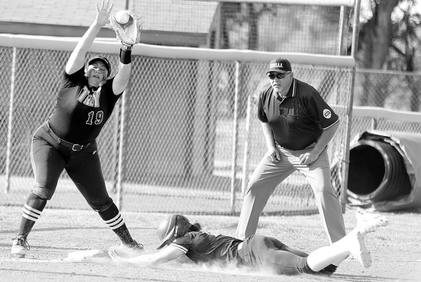 Campus High’s Alexis Butler slides safely into third base during the Colts’ Class 6A regional championship win over Topeka High School last week. Stephanie McKennoon/TSnews