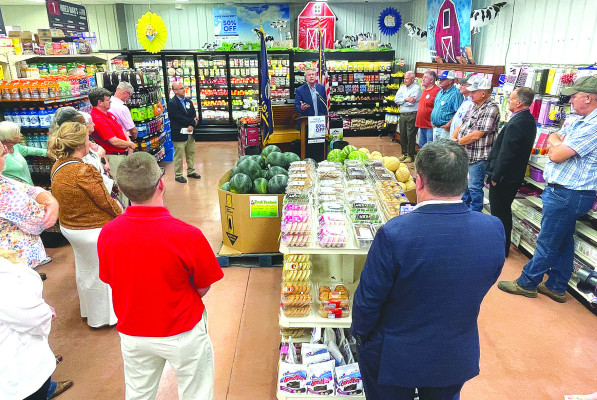 ABOVE: A crowd listens to U.S. Sen. Roger Marshall speak about the Add Milk! program, which is now available at Hired Man’s Grocery and Grill. The program provides halfprice purchases on certain milk products for customers using SNAP benefits. Hired Man’s is the first, and so far only, store in Kansas to have
