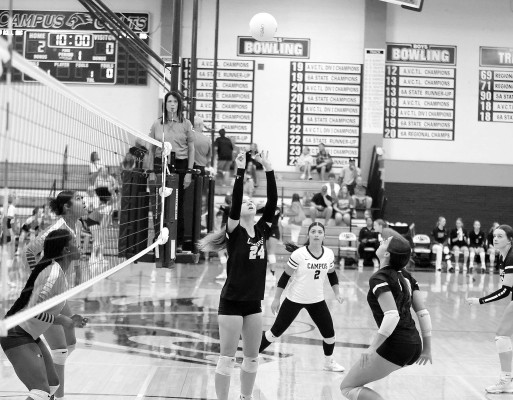 Emily Nedeau sets the ball for her teammates during one of the Campus Colts matches at their home tournament last Saturday. The Colts went 2-2. Stephanie McKennon/TSnews