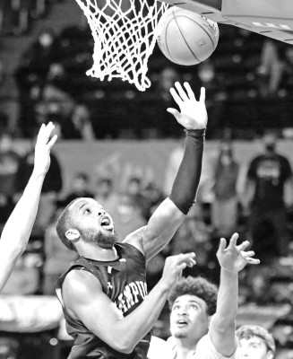 Campus High’s Sterling Gaston-Chapman goes up for 2 points while playing Blue Valley North in the 2021 Class 6A State championship game at Koch Arena. Gaston-Chapman has been named to the All-Lone Star Conference team. Stephanie McKennon/TSnews