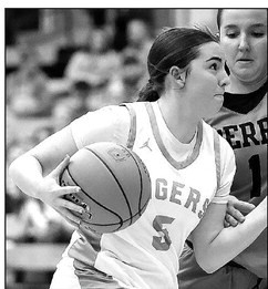 Eisenhower’s Emmarie Bargerdrives around a Derby defender during the Tigers’ homecoming game against the Panthers, ranked No. 2 in Class 6A. Matt Buchar/Ginger Viking Fotos