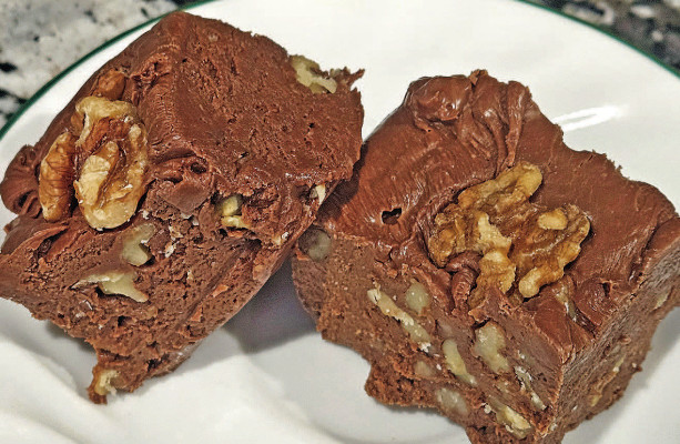 Million dollar fudge is a rich treat, made with fluffy marshmallow crème and featuring lots of crunchy walnuts to create a wonderful texture.