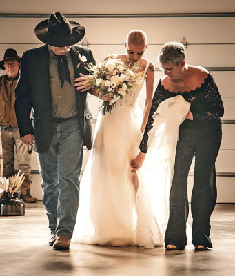 Esther Furches gets ready to walk down the aisle during her recent wedding with her parents, Mike and Lisa Farrell. Furches, who beat cancer once in the past year, lost her second battle last week. Contributed photo