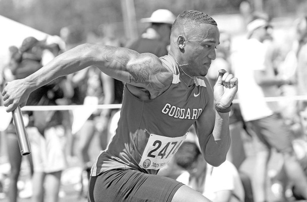 Goddard’s Jaden Cohen explodes out of the blocks at the start of the 4x100-meter relay. The Lions found their way to the medal stand in the event, placing eighth. Travis Mounts/TSnews