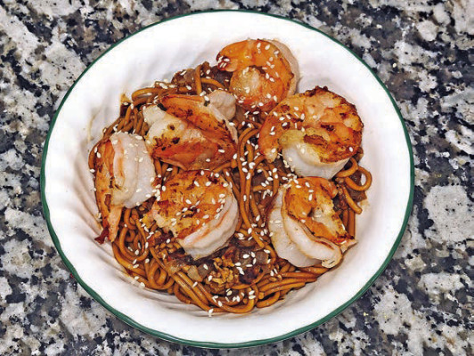 These easy garlic shrimp noodles features a sweet sauce, punctuated by fresh garlic and ginger, along with lots of tasty pasta to soak it all up.