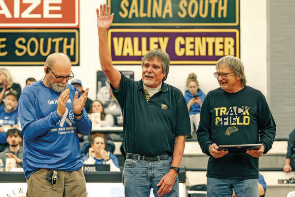 Tim Wilson, center, was inducted into the Campus High School Hall of Fame on Friday. He competed in both cross country and track and field for the Colts. Contributed photo