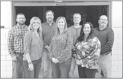 Back row, from left: Shawn White, Shane Morrison, Scott Jones, and Brian Fitch. Front row, from left: Sarah Vineyard, Melinda McCurley, Tiffani Callaway