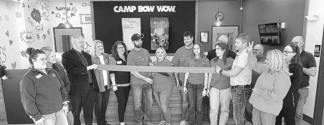 The Goddard Chamber of Commerce joined with Camp Bow Wow owners and staff on Feb. 22 for a ribbon cutting. The business on Kellogg Drive has been open for a few months, and provides doggy daycare, overnight boarding, and other enrichment services. It was featured previously in TSnews. Travis Mounts/TSnews