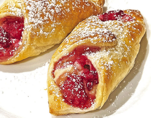 Raspberry danishes include decadent sweetened cream cheese, along with tart fresh berries and crunchy puff pastry. They can also be made with pretty much any fresh berry, if raspberries aren’t your thing.