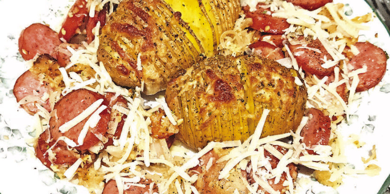 The combination of kielbasa sausage, onions and hasselback potatoes, along with some delicious sauce ingredients and a generous sprinkling of sauerkraut, makes for a hearty dish with a big punch of flavor.