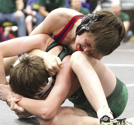 Cayle Mruk of Cheney works to control Kolton Whisler of Mulvane during a match at 106 pounds. Travis Mounts/TSnews