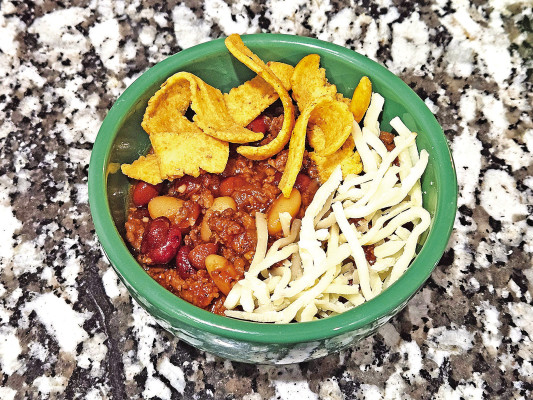 Beans in a pot come together quickly and finish in the crockpot, making for a barbecue-sauce-forward dinner. The recipe can easily feed a crowd or be ready for tasty leftovers later on.