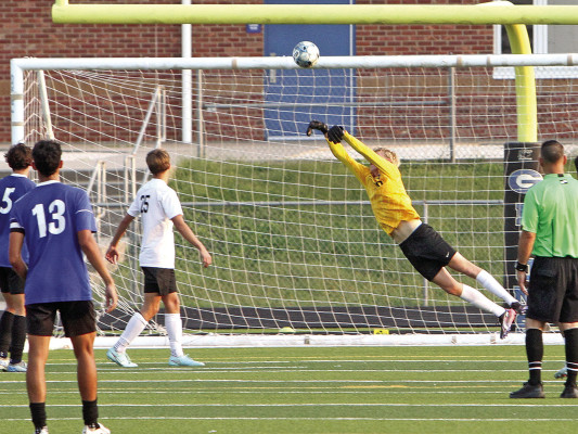 Campus goalkeeper Chance Noel denies the Goddard Lions a goal in the final minute of the first half at last Thursday’s game, hosted by Goddard. It proved to be a key moment in the Colts’ victory.