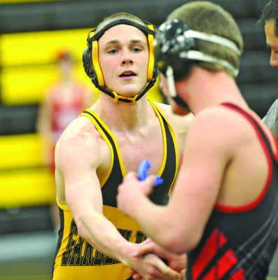 Garden Plain wrestler Evan Farmer congratulates his opponent following a win ast last week’s tournament. Dale Stelz/TSnews