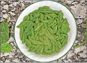 This spinach pasta is made with only three ingredients, including fresh spinach, flour and salt. It is easy to make and can be paired with a variety of sauces.