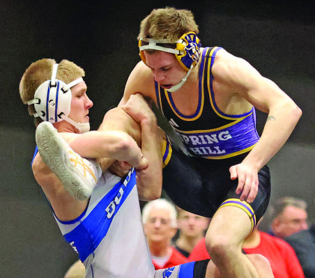 Jacob Goodwin works to take down an opponent during the Class 5A State wrestling tournament on Saturday in Park City. He won his third individual State title, helping the Lions to another State championship. Stephanie McKennon/TSnews