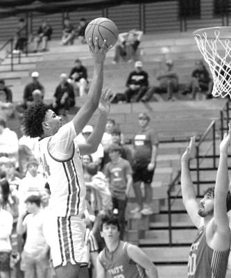 Quaid Thomas takes a shot during Cheney’s win over Pratt in the Cardinal Classic championship on Saturday. The Cardinals overcame 8-point deficits in each half. Travis Mounts/TSnews