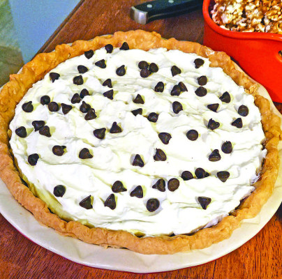 Toll House chocolate chip cookie pie is a rich dessert based on the classic cookie, with a chewy filling, crunchy walnuts and pops of sweet chocolate.