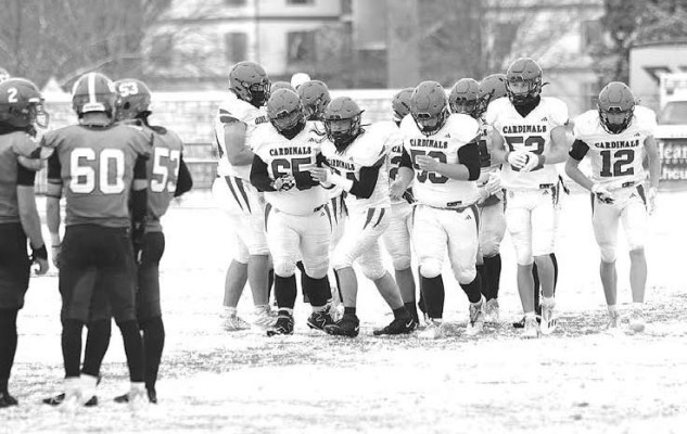 The Conway Springs Cardinals break the huddle during their championship win over the Jefferson County North Chargers. Stephanie McKennon/TSnews