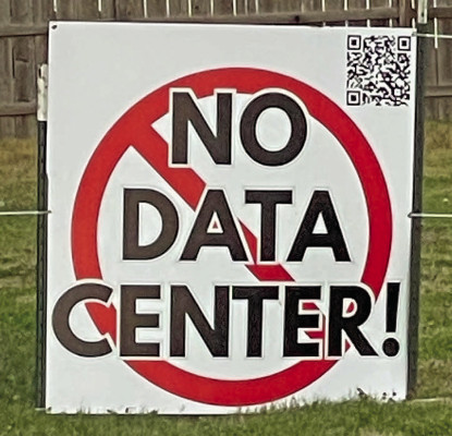 “No Data Center” signs have appeared all over western Sedgwick County as public opposition grows against the possibility of large-scale data centers being constructed on rural land between Garden Plain, Andale and Colwich. Travis Mounts/TSnews