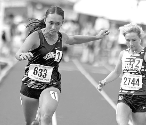 ABOVE: Campus’ Olivia Moffitt crosses the finish line in the 100 meters preliminary race on Saturday. She also ran in the 200, where she made it to finals. Stephanie McKennon/TSnews