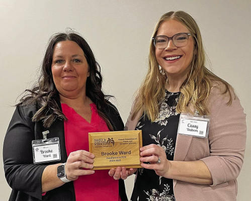Brooke Ware, left, was presented with the FCS In Excellence Award in February. Contributed photo