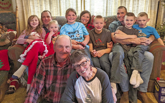Mike Volavka and his wife, Debbie, pictured with their family. The were married 46 years ago and had three children together. They farmed in Argonia and were partners on the farm since they got married. Debbie died of a heart attack last October. Contributed photo
