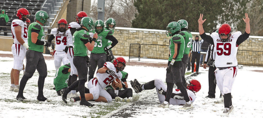 Offensive lineman Jacob Osner, right, let’s everyone know the Conway Springs Cardinals scored a touchdown during the fourth quarter of Saturday’s State championship. Cade Howell made the touchdown run. Stephanie McKennon/TSnews