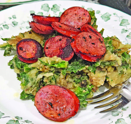 Stamppot is a traditional dish from the Netherlands, featuring creamy mashed potatoes, fresh kale and smoked sausage to create a hearty, but simple, meal.