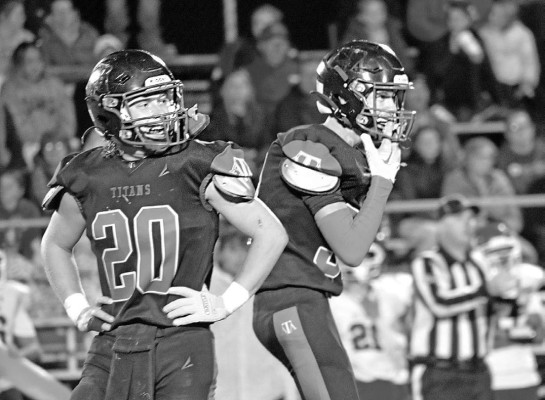 The Titans celebrate a big play during their playoff victory in Argonia last week. Savannah Shively/Contributed photo