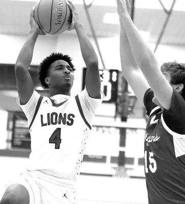 Goddard’s Erv Phillips drives to the basket during last week’s home contest against Andover. Stephanie McKennon/TSnews