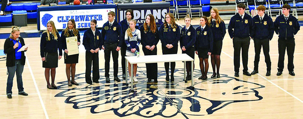 Clearwater High School FFA students are recognized during last Friday’s home basketball games. The new FFA affiliate program has received its official charter, and it was signed on Friday. Contributed photo