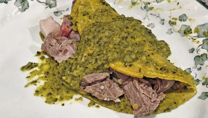 Pork enchiladas with mole verde features a roasted pork tenderloin smothered with a bright tomatillo- based sauce that features a ton of fresh flavors.