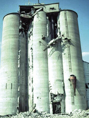 The DeBruce grain elevator is shown in the immediate aftermath following its explosion on June 8, 1998, creating a tough scene and many tough calls for responding firefighters. Contributed photo/Sedgwick County Fire District No. 1